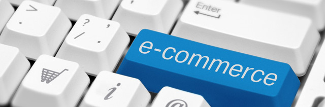 Retail wine shop with customer shaking hand with cashier.