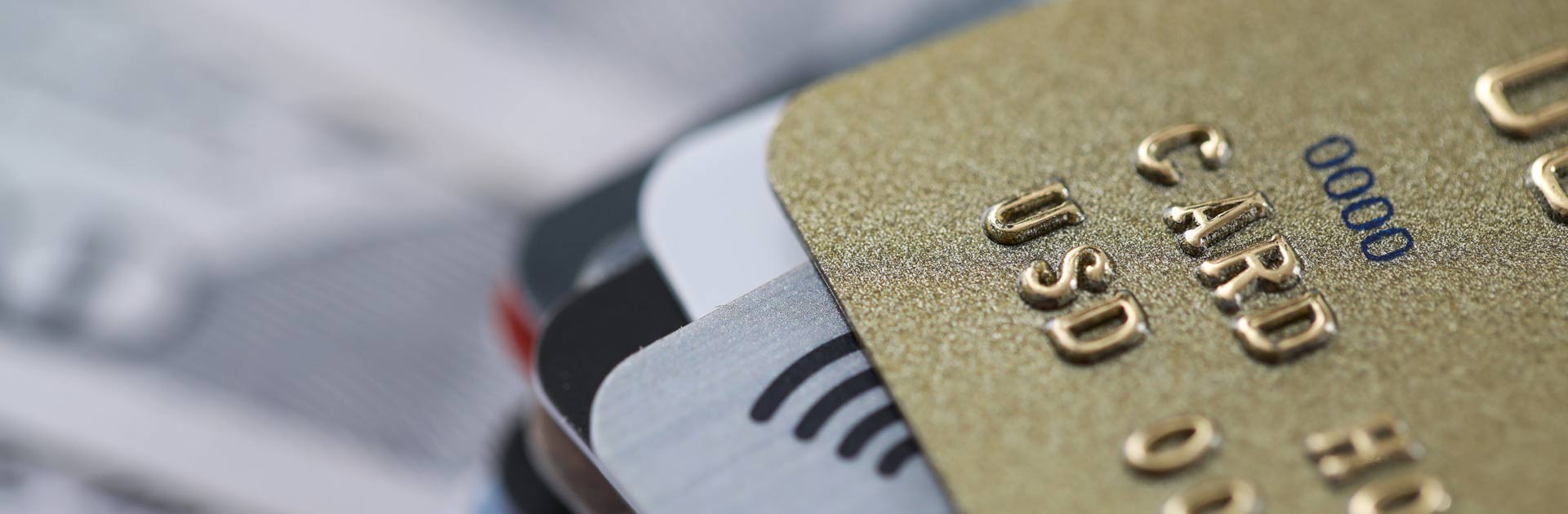 Extreme close-up of stacked credit cards.